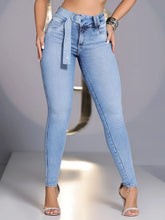 CALÇA SKINNY MODELADORA COM CINTO E APLICAÇÕES EM BRILHO